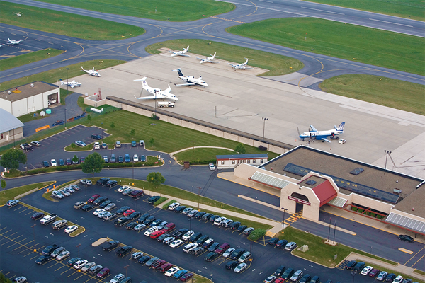 University Park Airport overhead shot of runway with parked planes