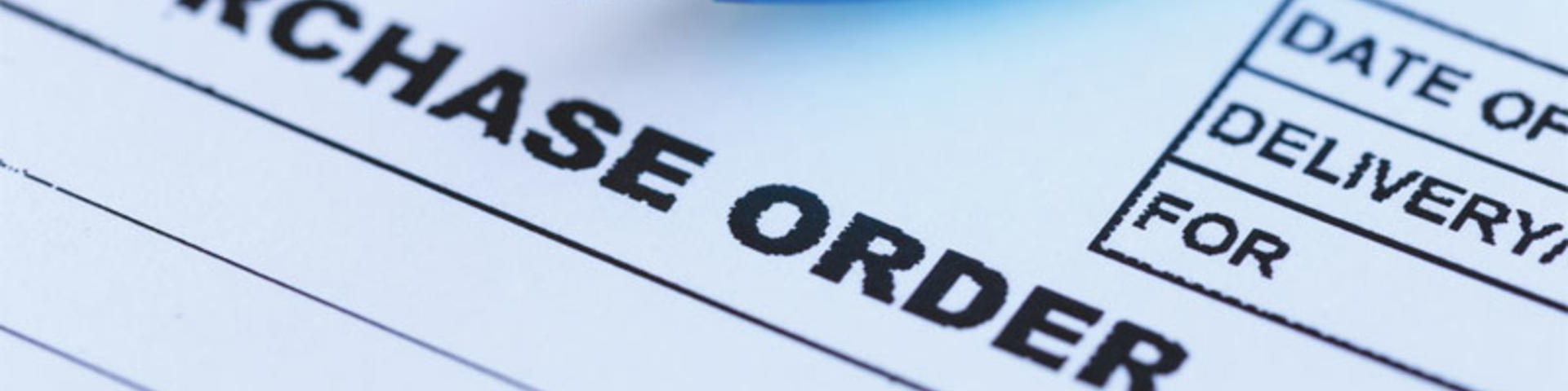 purchase order with blue pen in the office