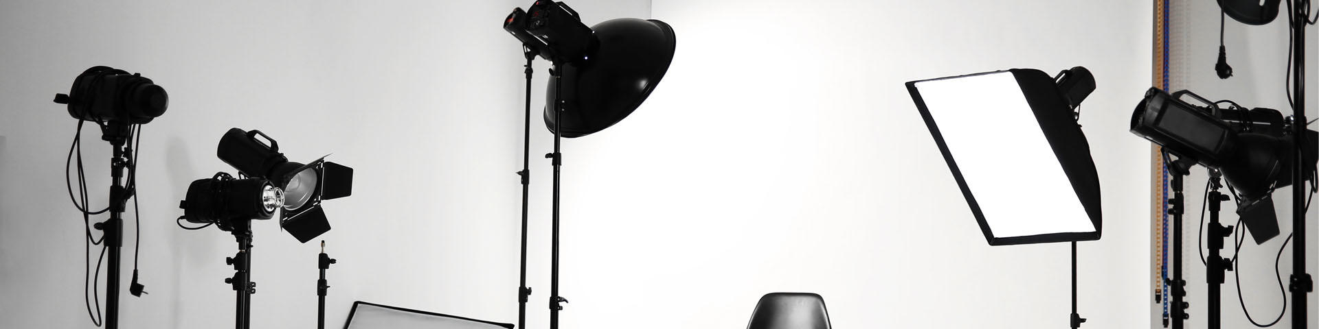 Empty photo studiio with lighting equipment