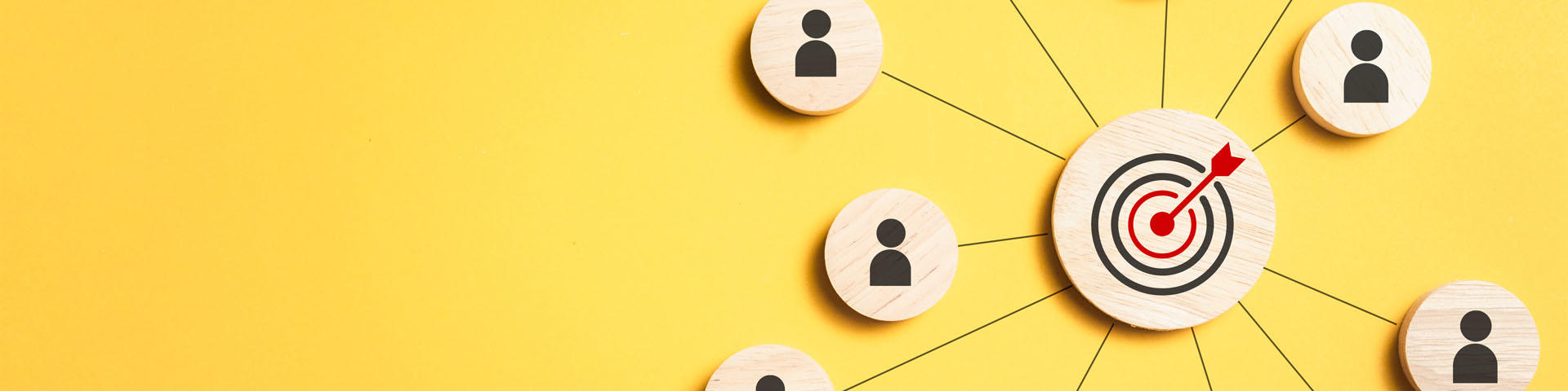 Customer relationship management concept, wooden block with target icon linked with human icons for customer focus groups.